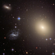 The brightest source is ESO325-G004, the galaxy doing the lensing